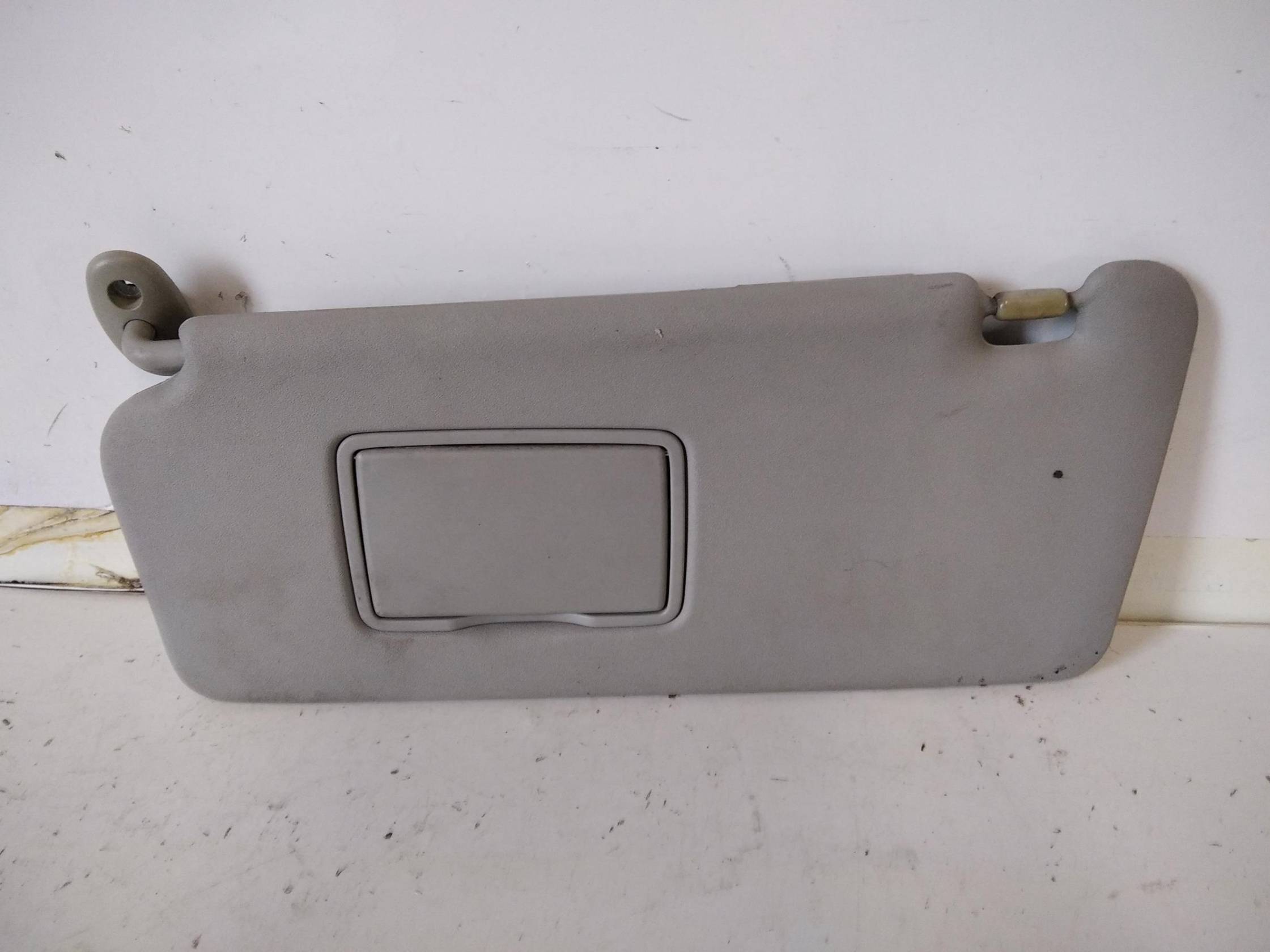 Aletta parasole parabrezza sx.